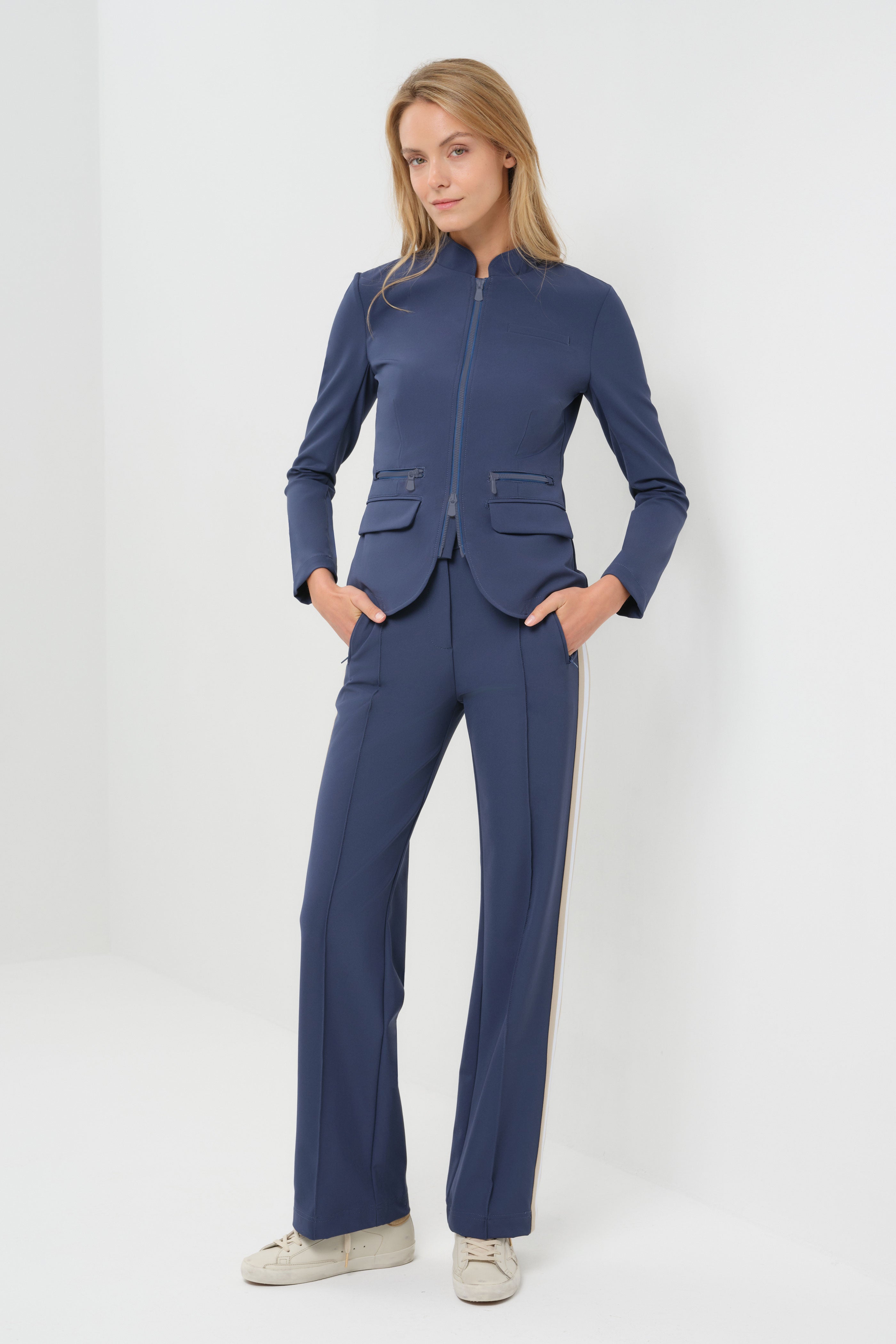 Studio Image of model wearing the Gisela Aeroflow Zip Front Twill Blazer