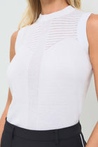 Detailed shot featuring delicate pointelle detailing across the upper chest and a vertical textured stripe down the center front.